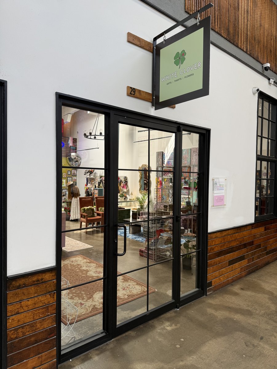 The White Clover storefront sign and entrance